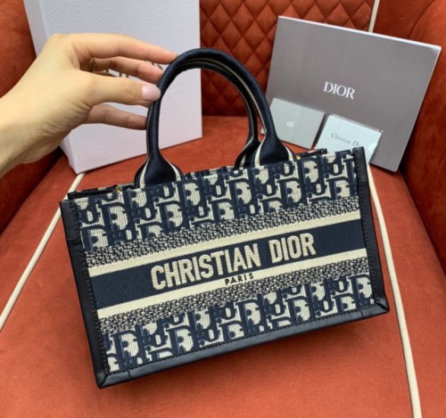 D. 오블리크 레더 스몰 북 토트백